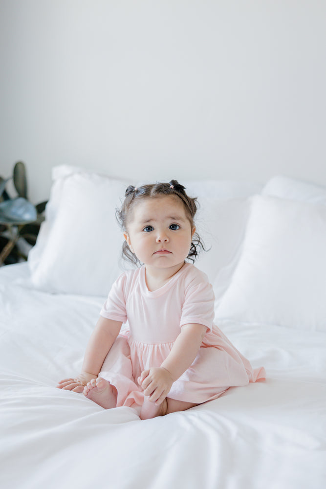Perfect peasy dress with built-in no-snap diaper coverage for easy changes and added comfort. 6-9 months in rose pink short sleeve, 1 year baby dress online shopping, baby stores online