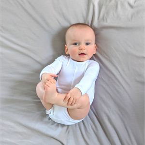 White, Signature No Snap Long Sleeve Peasy Onesie. Ultra soft, breathable, hypoallergenic, easy to change, no fuss. Size 3-6 months